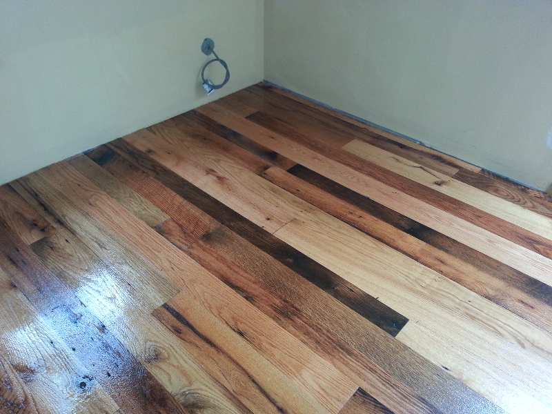 Reclaimed hardwood flooring finished by Midwest Hardwood Floors in a Wilmette home