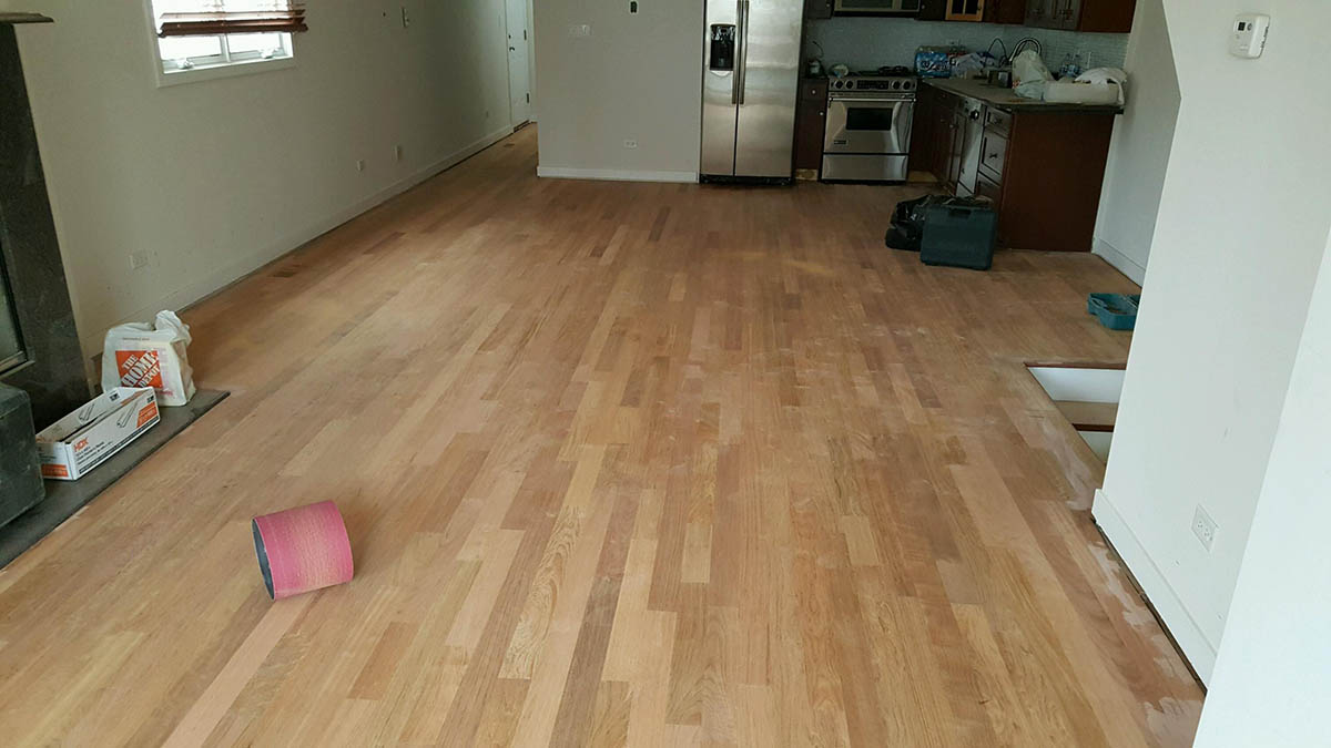 Unfinished Brazilian cherry hardwood floor before refinishing in a Chicago home