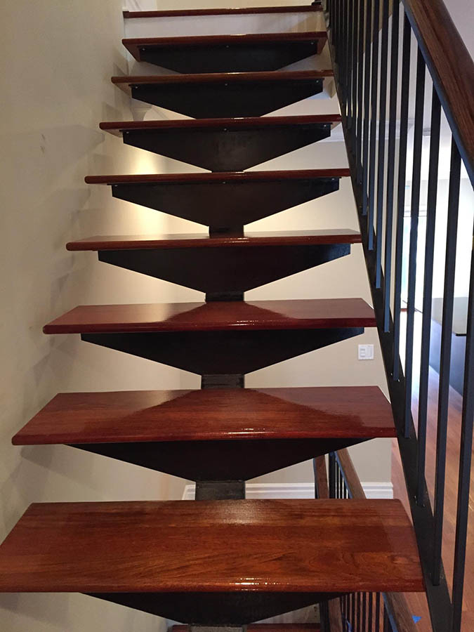 Custom Brazilian Cherry hardwood staircase with open risers in Lake Forest, IL by Midwest Hardwood Floors