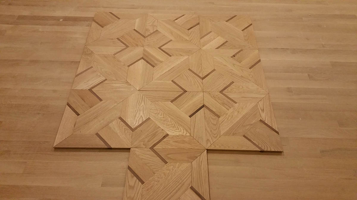 Custom white oak and Wenge hardwood floor pattern in Chicago, IL by Midwest Hardwood Floors