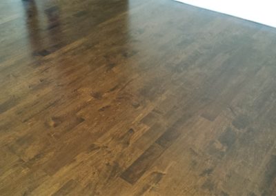 Dark stained maple hardwood floor
