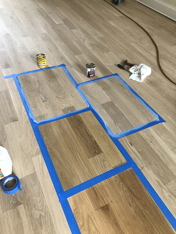 Stain color samples tested on white oak hardwood flooring in Glencoe, IL by Midwest Hardwood Floors