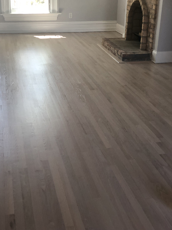 White oak hardwood floor refinished with Pickled Oak stain in Glencoe, IL by Midwest Hardwood Floors