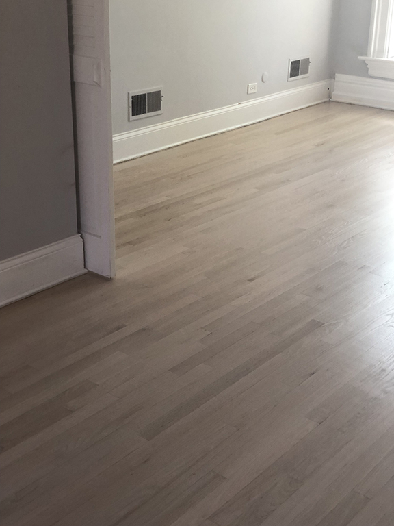 White oak hardwood flooring refinished with Pickled Oak stain in Glencoe, IL by Midwest Hardwood Floors