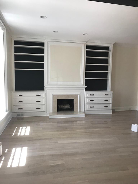 White oak living room floor refinished with Pickled Oak stain in Glencoe, IL by Midwest Hardwood Floors