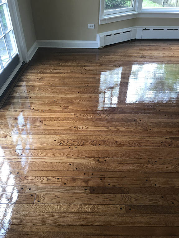 Restored and refinished oak hardwood flooring in Glencoe, IL by Midwest Hardwood Floors