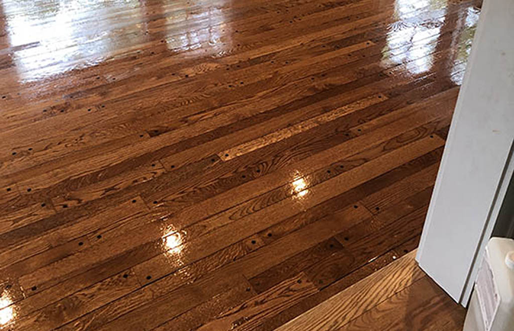 Freshly refinished oak hardwood flooring in Glencoe, IL by Midwest Hardwood Floors
