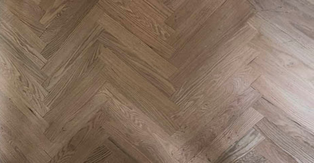 Finished herringbone hardwood flooring in Glencoe, IL by Midwest Hardwood Floors