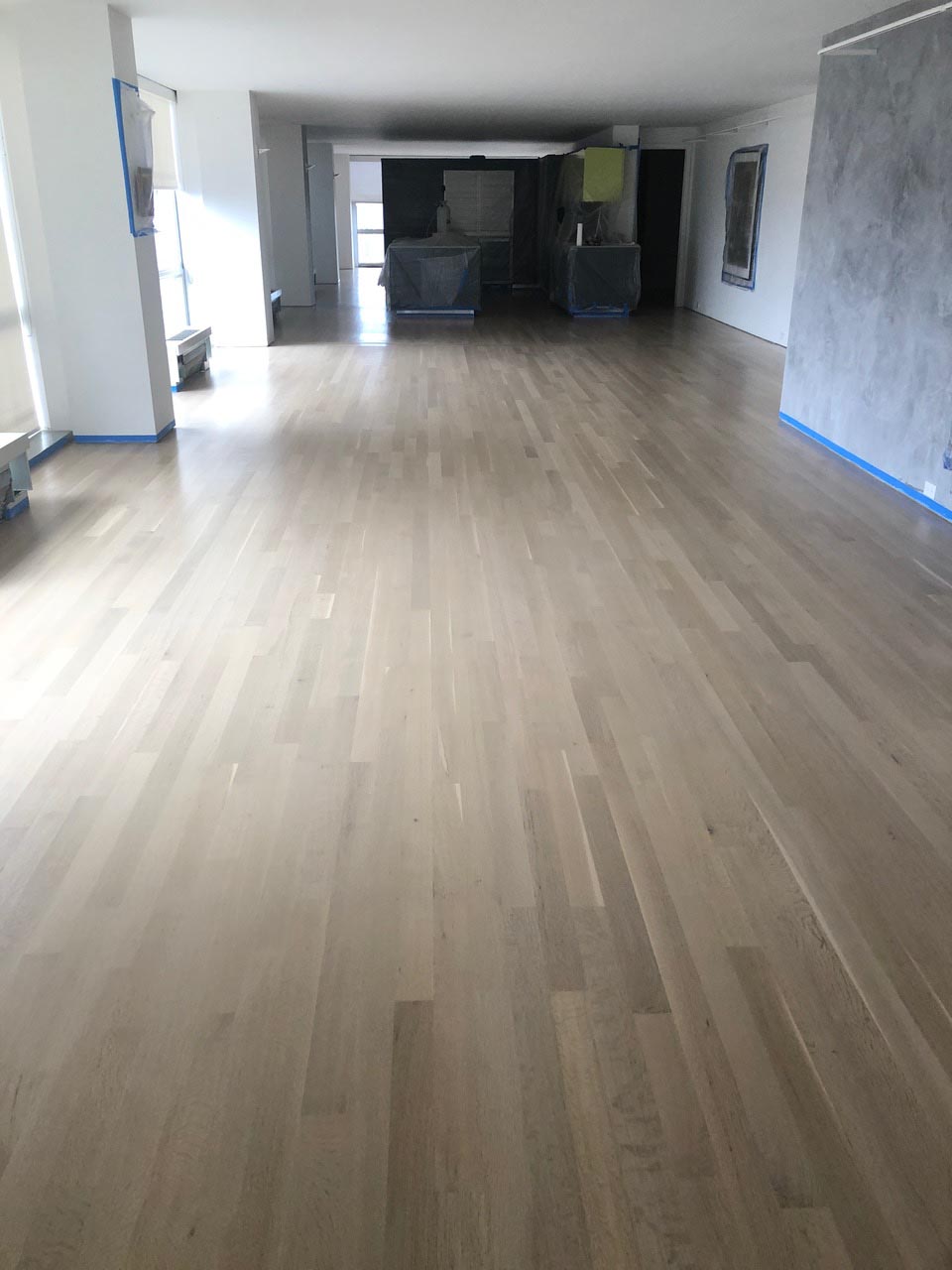 White oak hardwood floor finished with Country White stain by Midwest Hardwood Floors