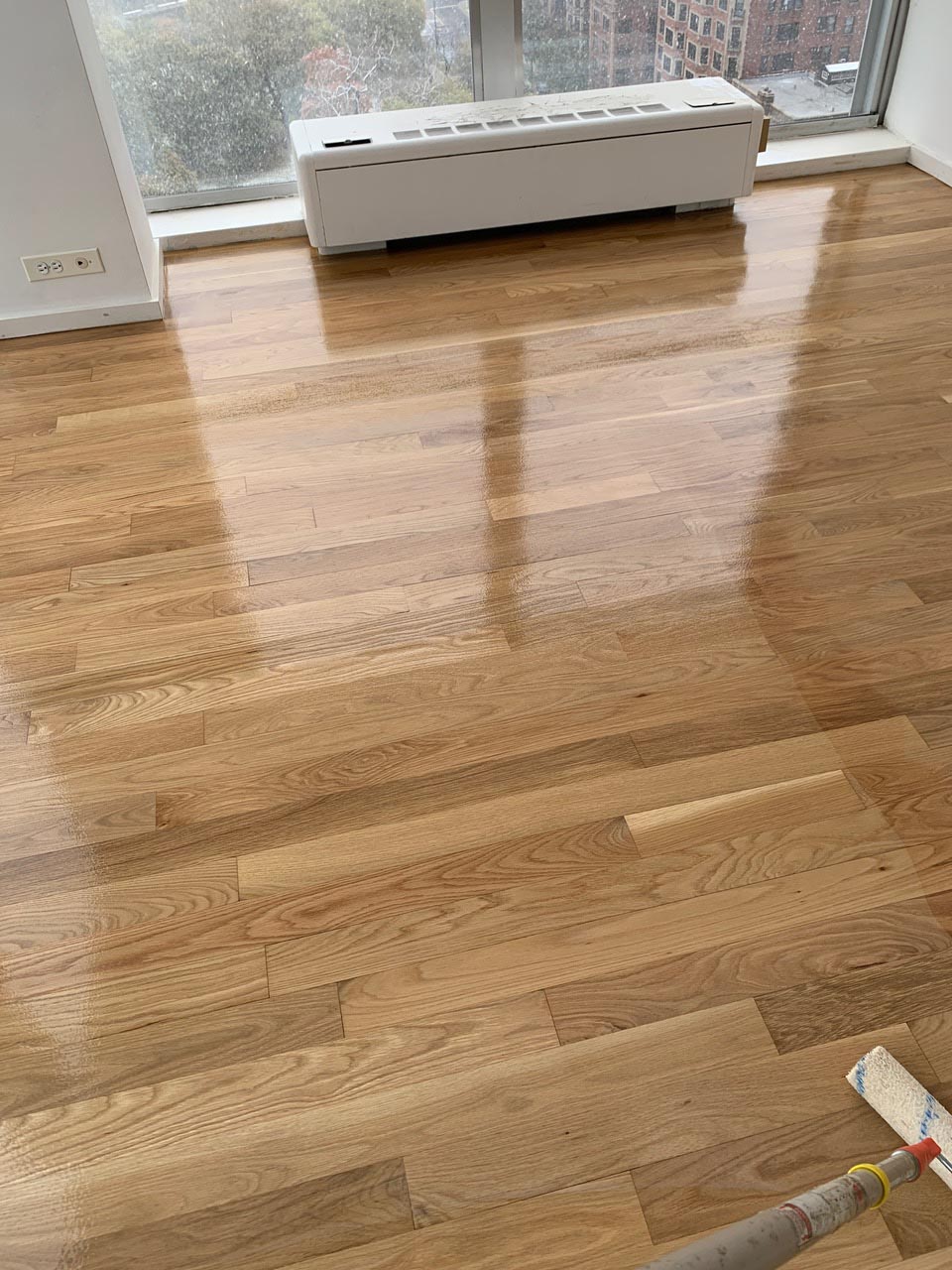 Red oak hardwood floor after professional repair and refinishing by Midwest Hardwood Floors