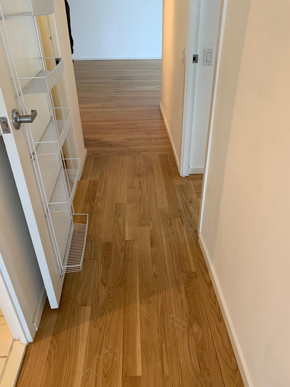 Finished red oak hardwood flooring after repair and refinishing by Midwest Hardwood Floors