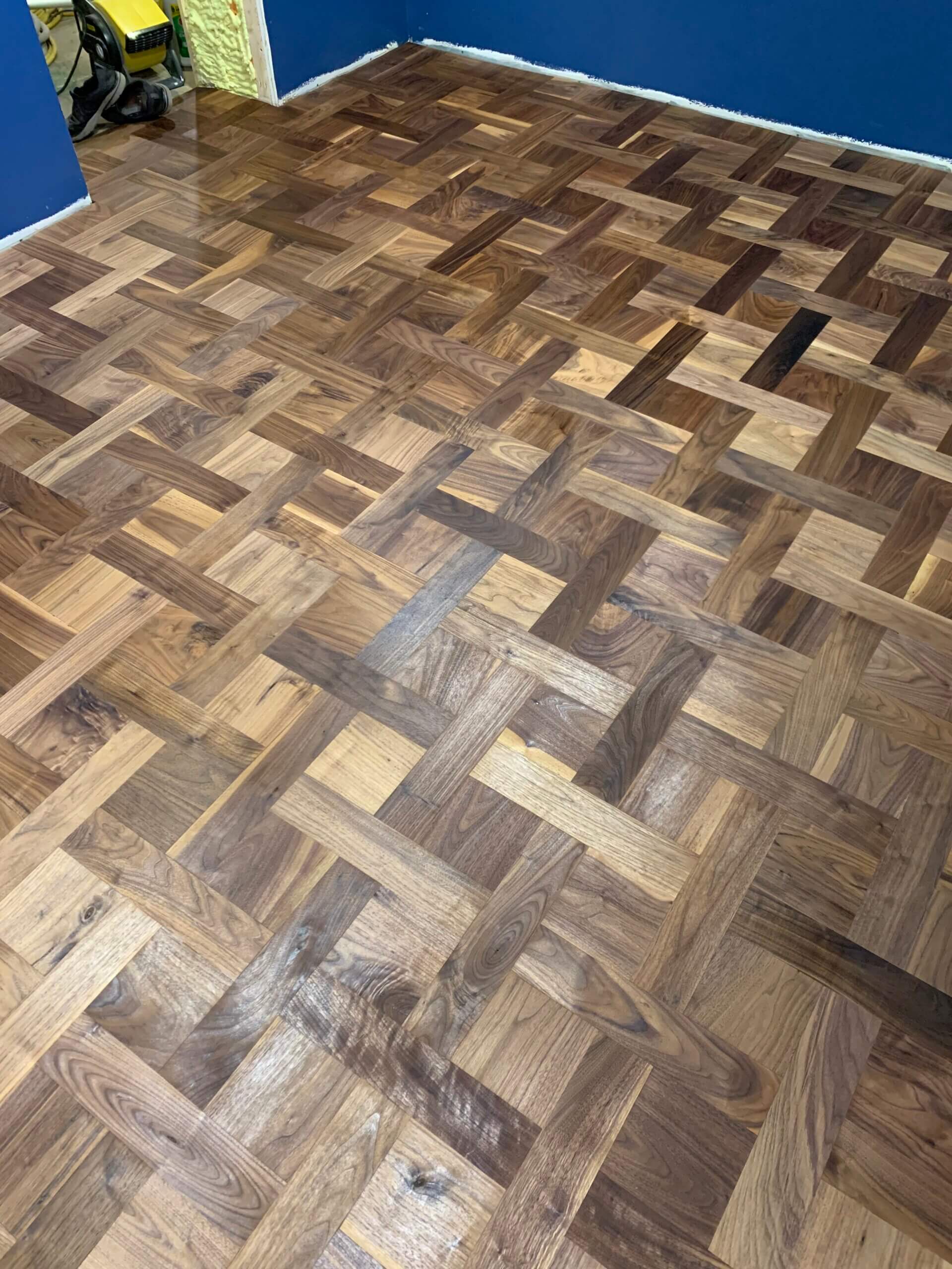 Repaired teak parquet hardwood flooring in Wilmette, IL by Midwest Hardwood Floors