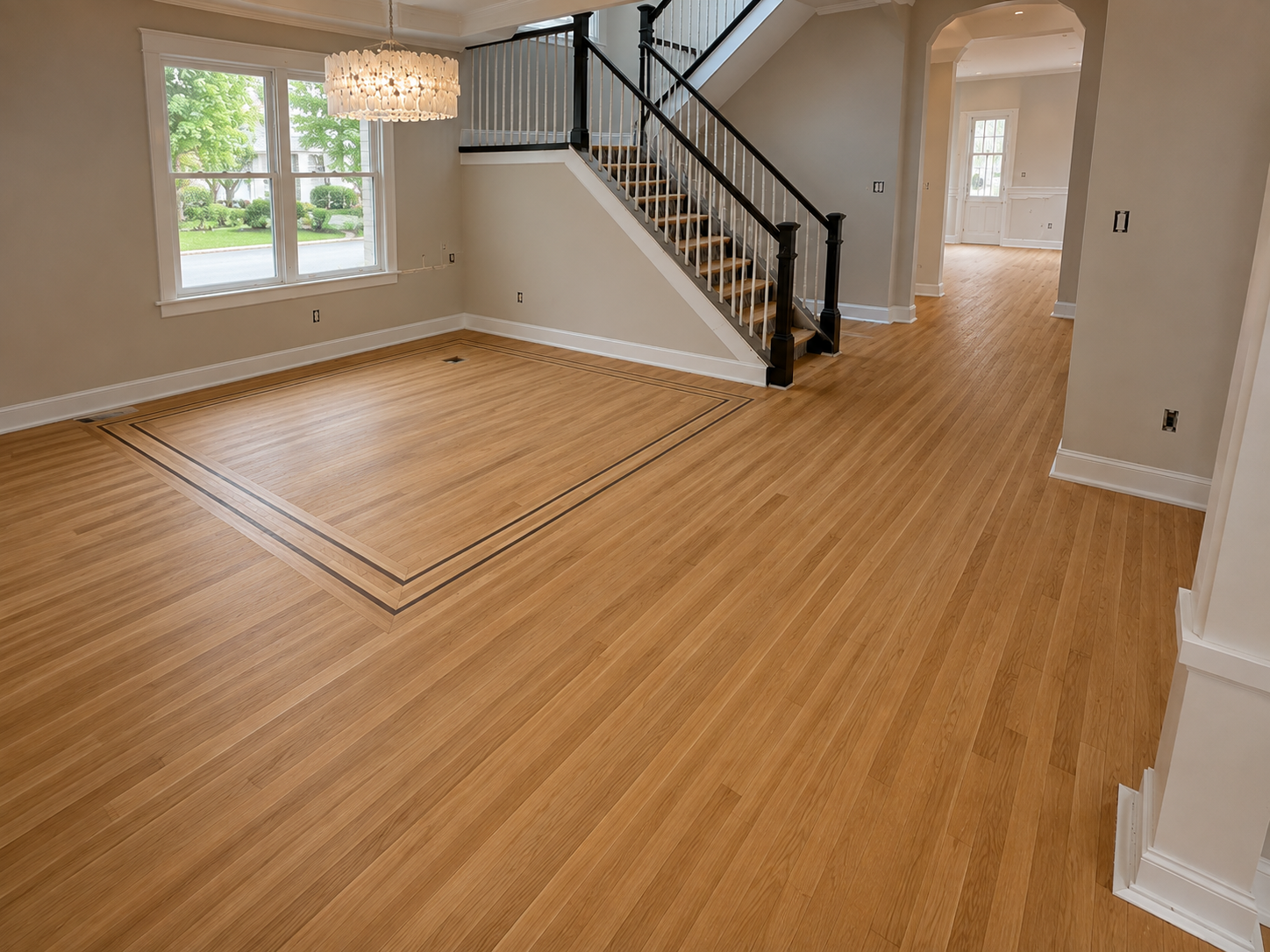 Golden refinished hardwood floor with decorative border in Winnetka, Illinois
