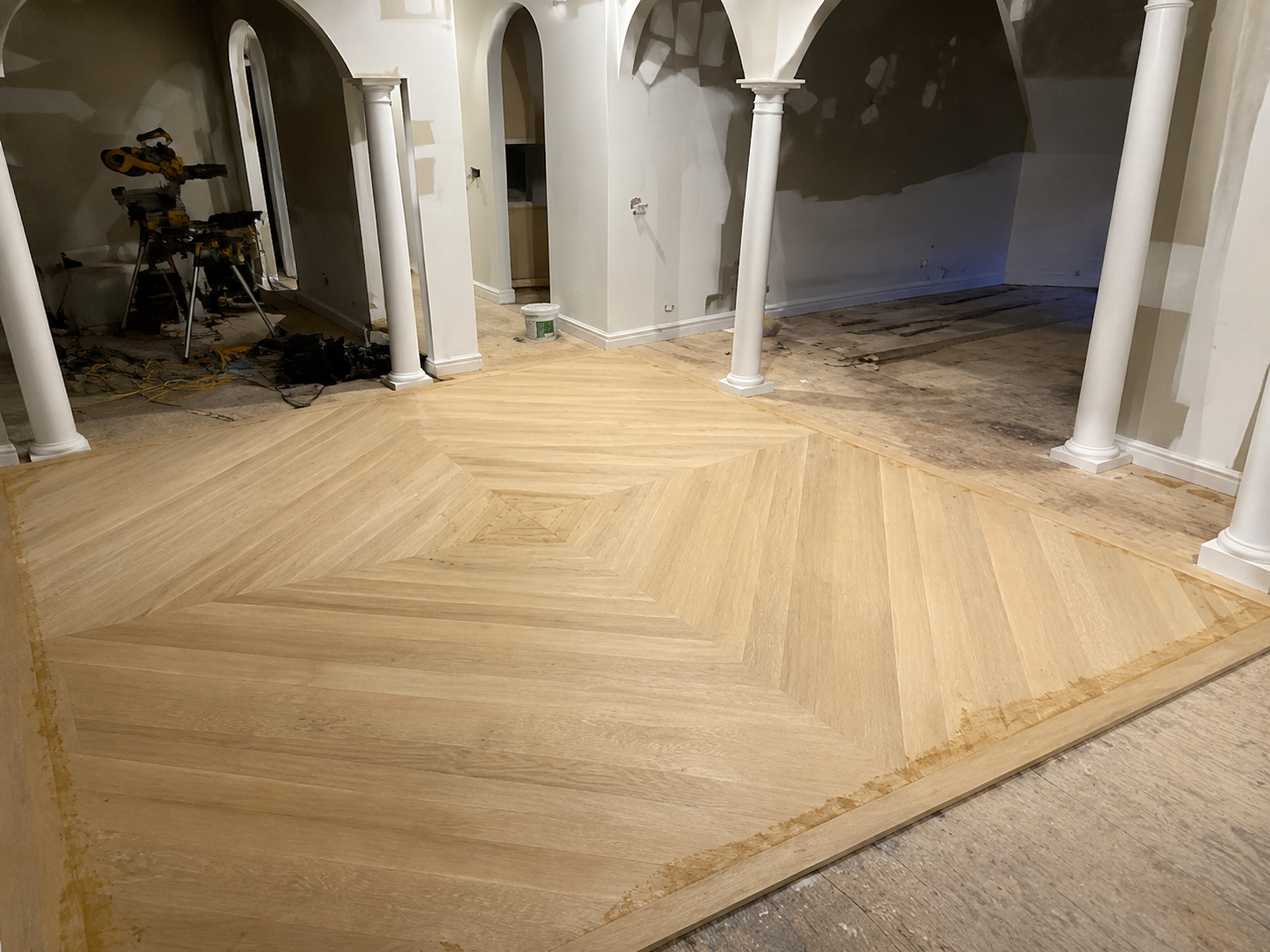 Unfinished hardwood floor during a professional refinishing project in Lincolnwood, Illinois