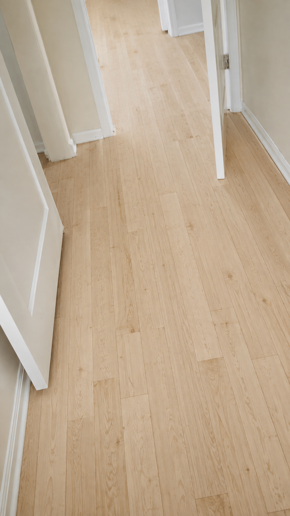Unfinished maple hardwood flooring in hallway in Chicago, IL by Midwest Hardwood Floors
