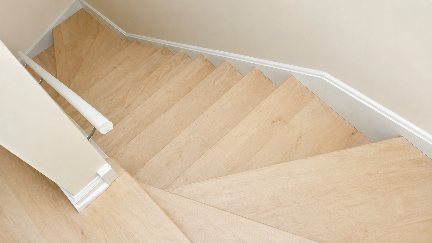Unfinished maple hardwood staircase in Chicago, IL by Midwest Hardwood Floors