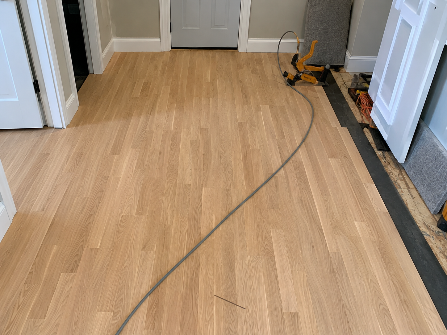 White Oak Hardwood Floor Installation in Wilmette | Midwest Hardwood Floors Professional white oak hardwood floor installation in a Wilmette home by Midwest Hardwood Floors.